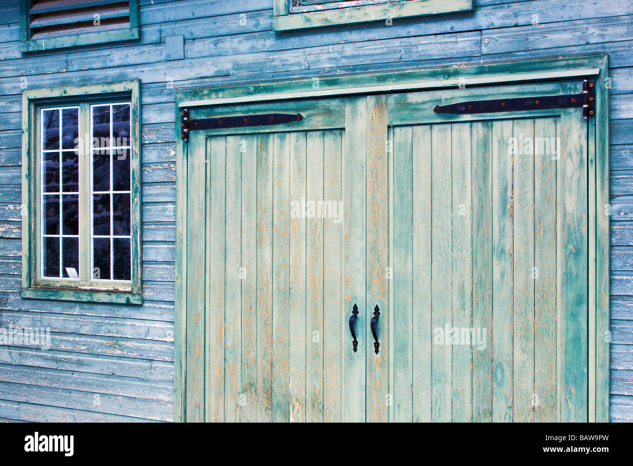 Exterior of a rustic pressure treated wood storage building Stock Photo