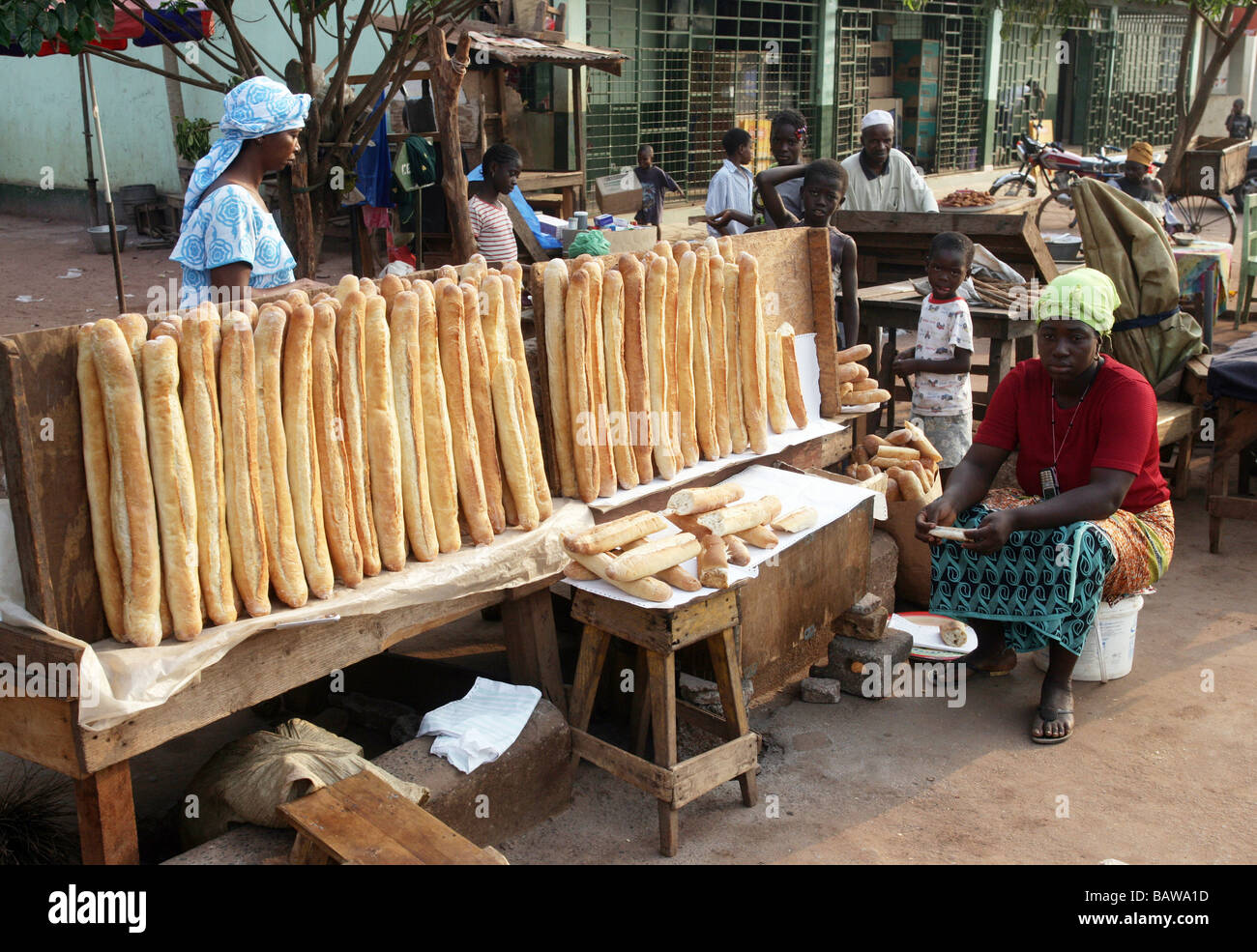 French baguette is offered on a braed stand in Kamsar, Guinea, West Afica Stock Photo
