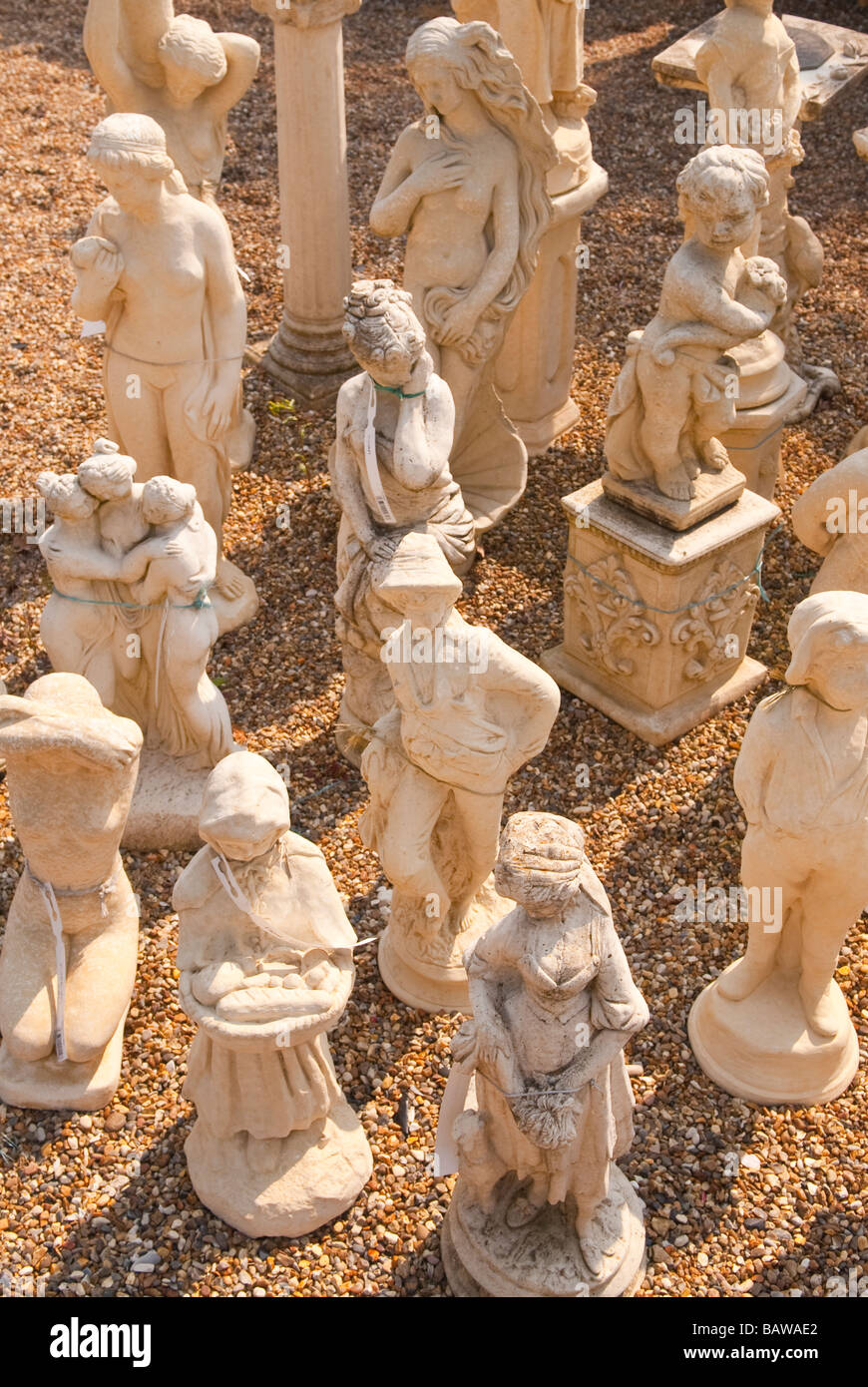 Garden concrete statues for sale at a uk garden centre Stock Photo Alamy