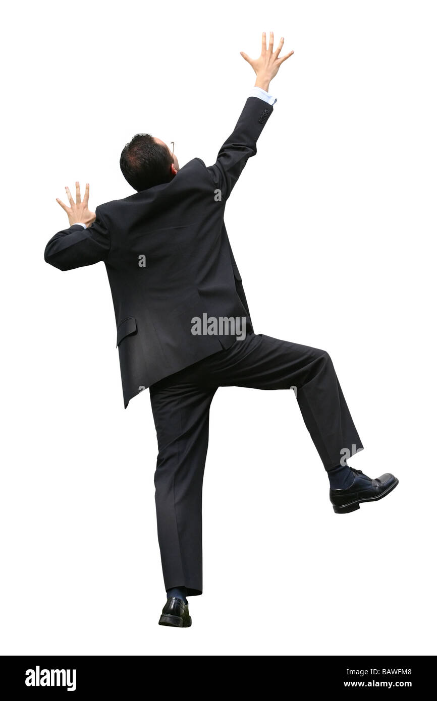 business man climbing a wall Stock Photo