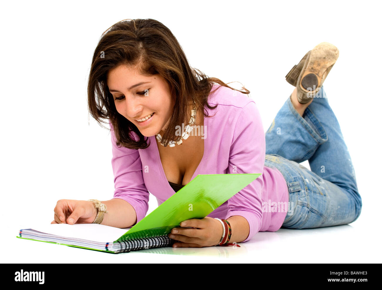 Female student reading a notebook Stock Photo