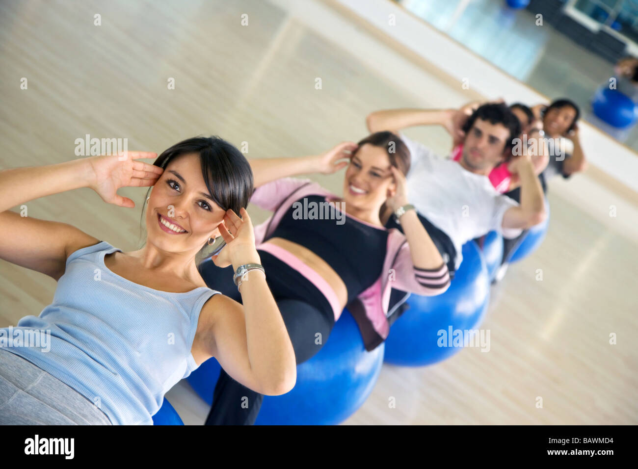Group doing abs exercises Stock Photo Alamy