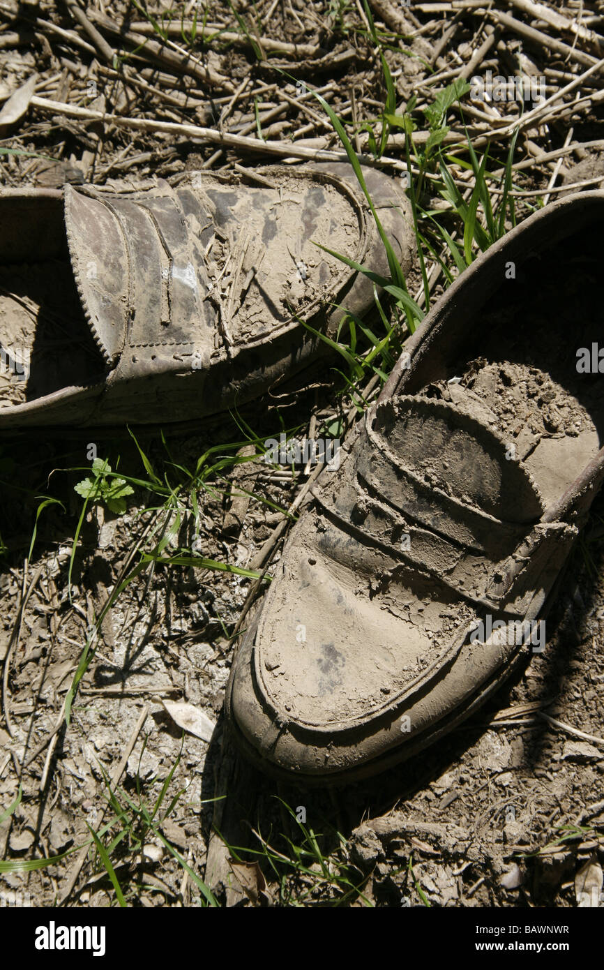Mud covered shoes hires stock photography and images Alamy