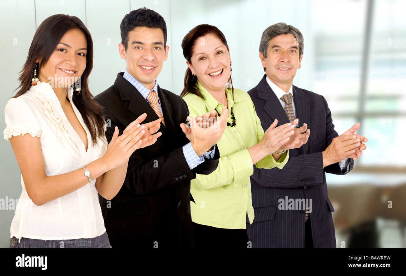 business office team smiling and applauding Stock Photo - Alamy