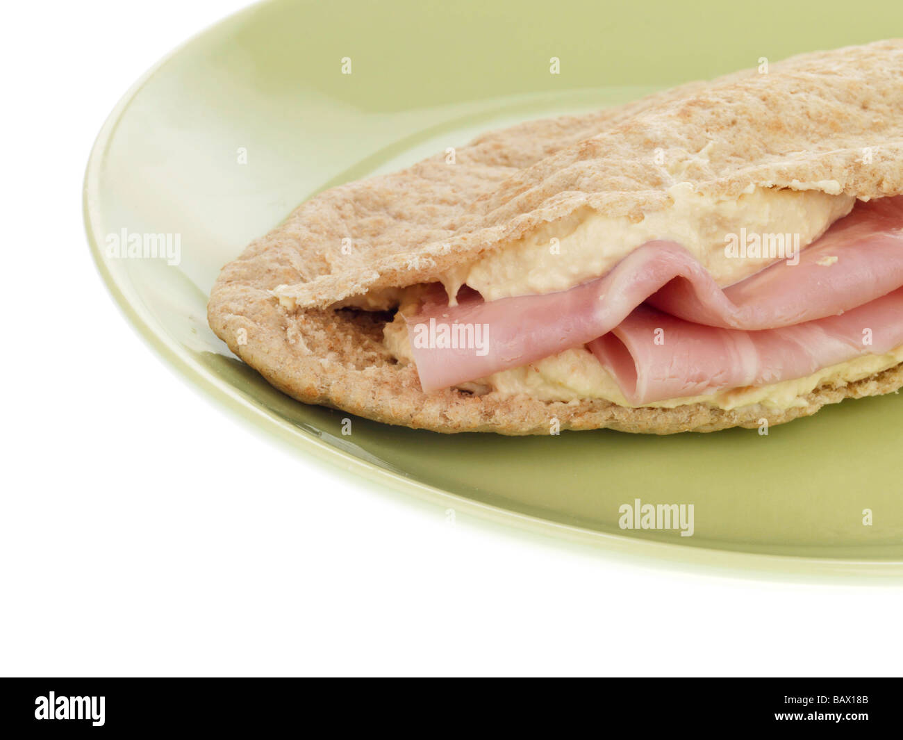Pitta Bread Stuffed with Hummus and Ham Stock Photo - Alamy