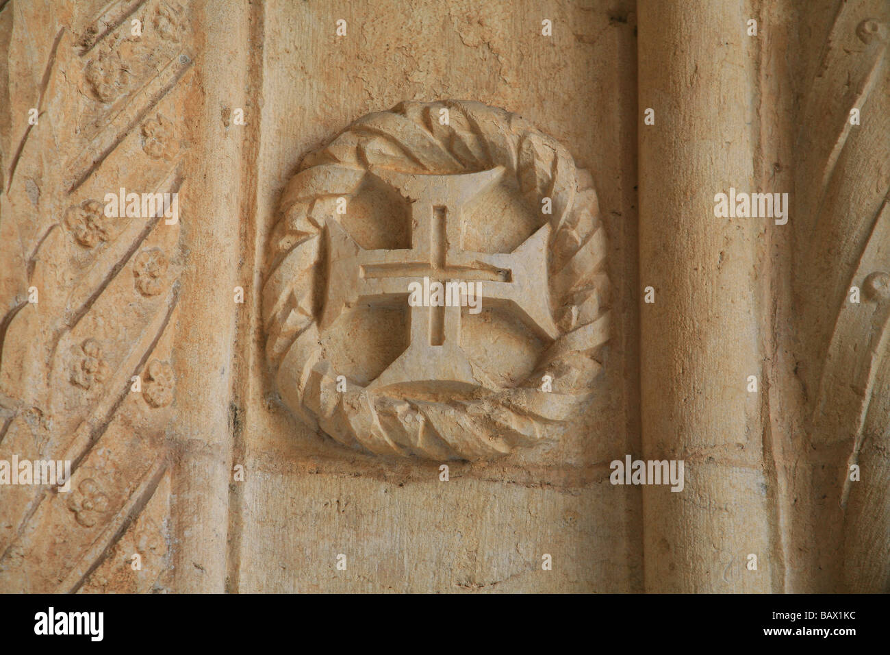 Symbol of the Order of Christ on a cloister column of the Jeronimos Monastery in Lisbon, Portugal Stock Photo