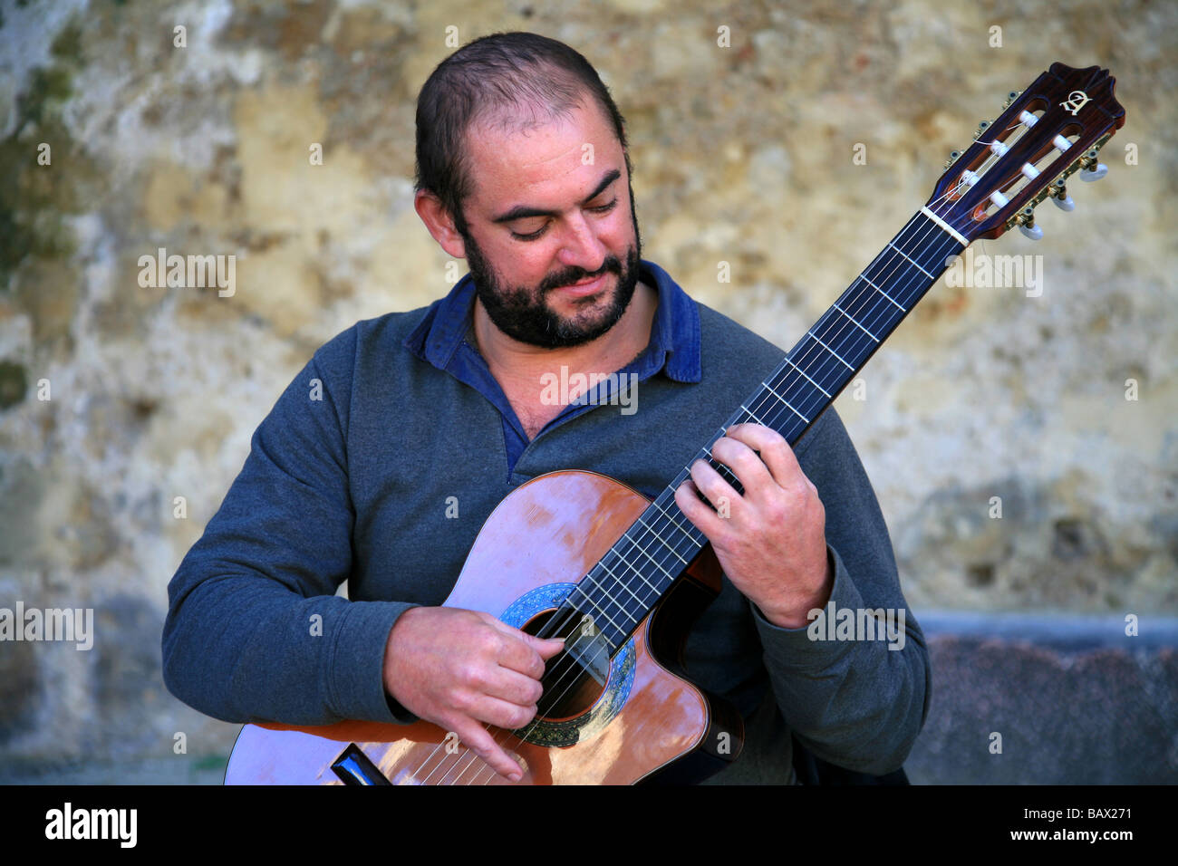 Portuguese guitar player at the Saint Castle in Lisbon, Portugal