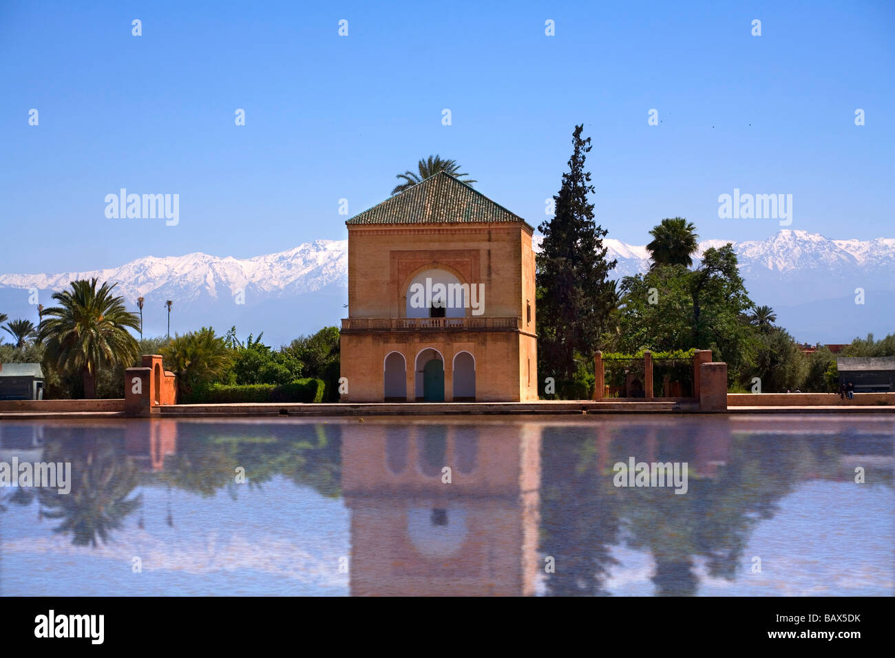 Menara Gardens  Marrakech Morocco , with the snow on the Atlas mountain range in the distance. Stock Photo