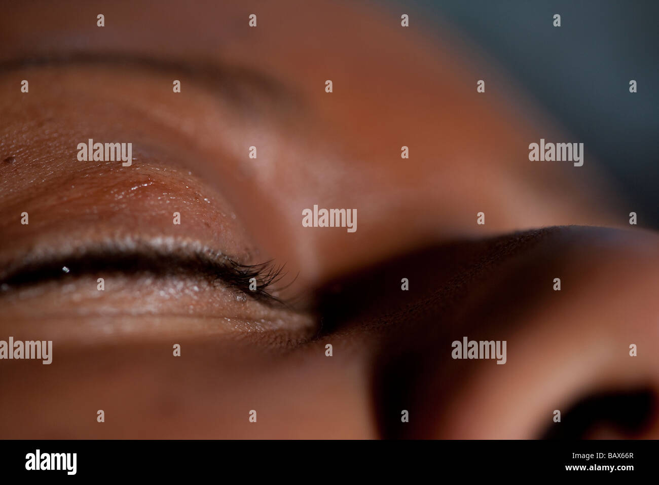 eyelid  of a black woman from a lower viewpoint Stock Photo