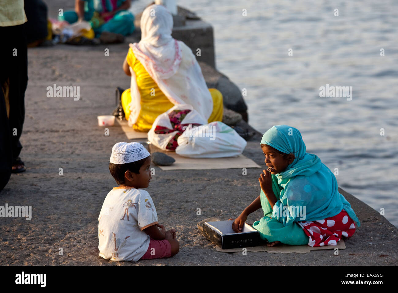 Children Begging Outside Haji Ali Tomb and Shrine in Mumbai India Stock Photo