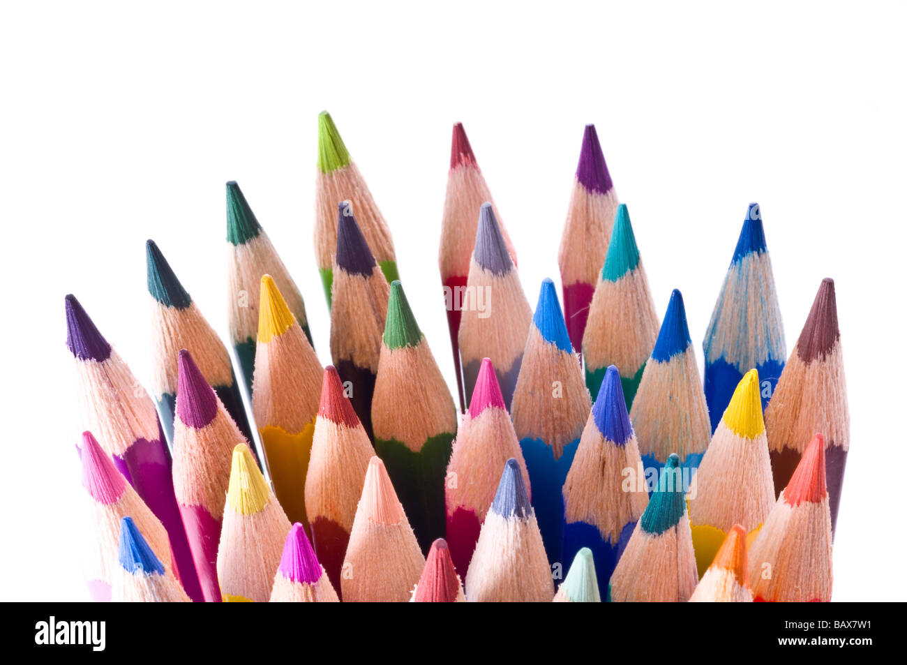 Color pencils in arrange in color wheel colors on white background Stock Photo