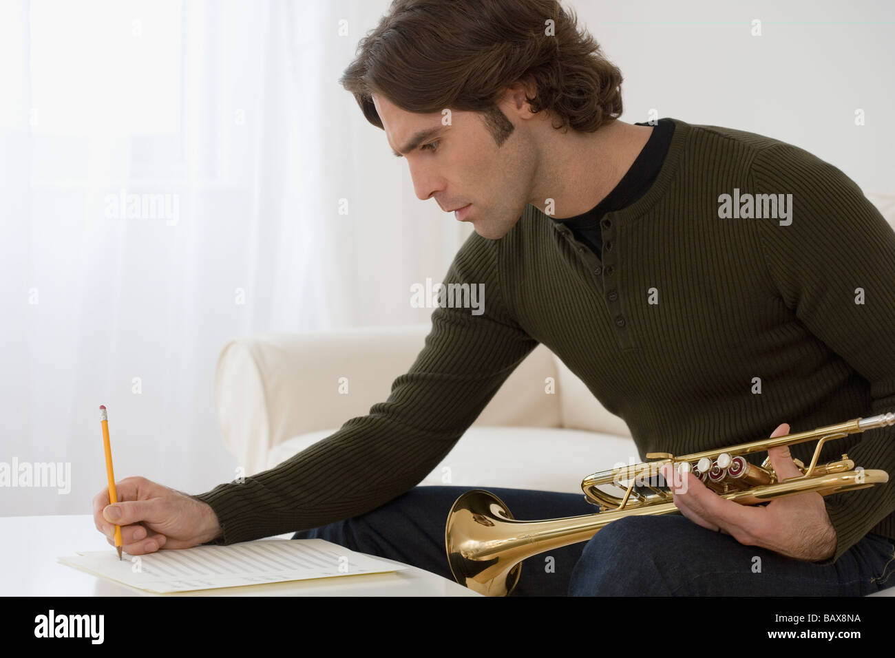 Man with trumpet hires stock photography and images Alamy
