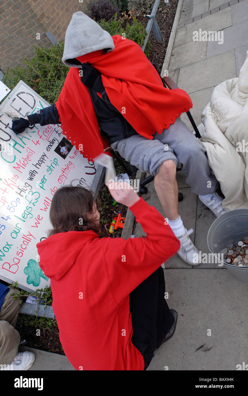 Students undertake shaving and waxing for charity Stock Photo Alamy