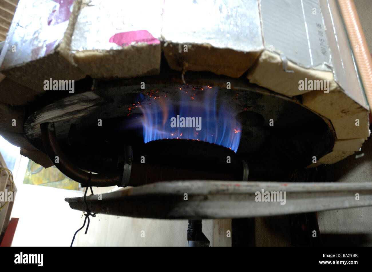 Cow dung generated methane burning in water heater, Pembrokeshire