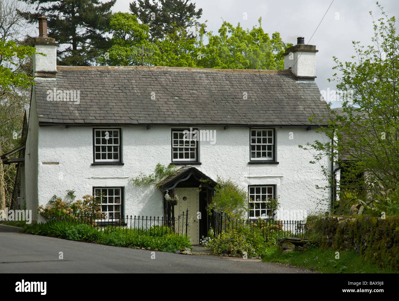 Traditional lakeland cottage in the village of Troutbeck, near Ambleside, Lake District National Park, Cumbria, England UK Stock Photo