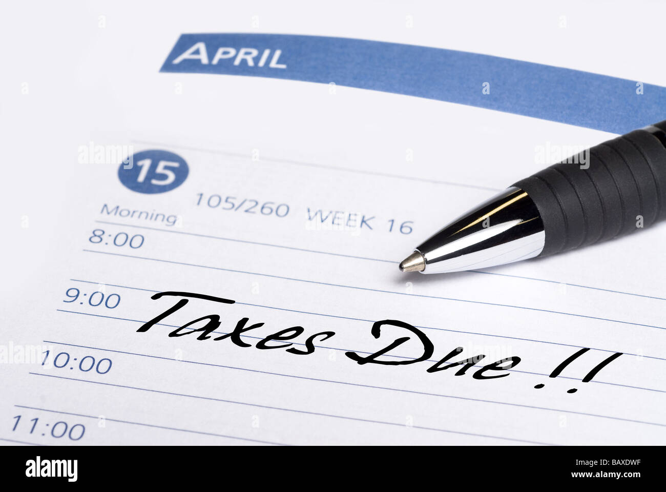 A date book communicates a reminder that taxes are due on April 15th Stock Photo
