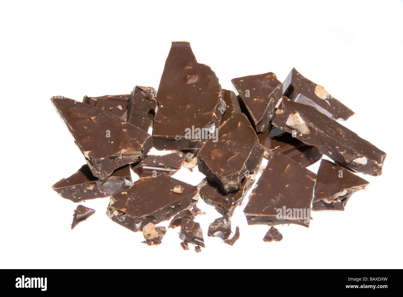 Chunks of milk chocolate with almonds isolated on white Stock Photo