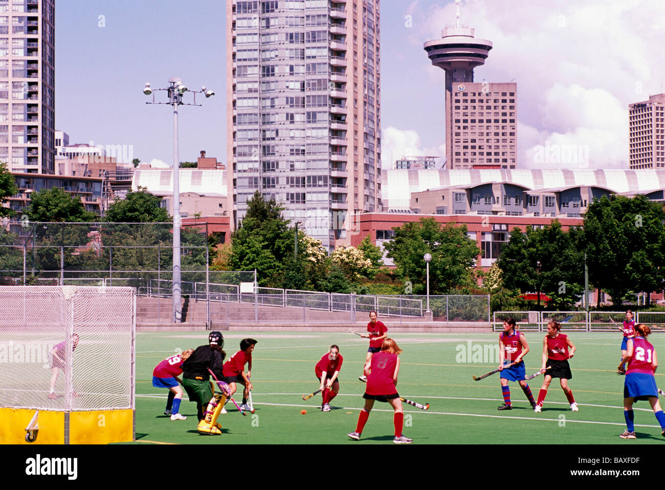Women playing Women's Field Hockey Sport at 'Andy Livingstone' Park  Downtown in the City of Vancouver British Columbia Canada Stock Photo