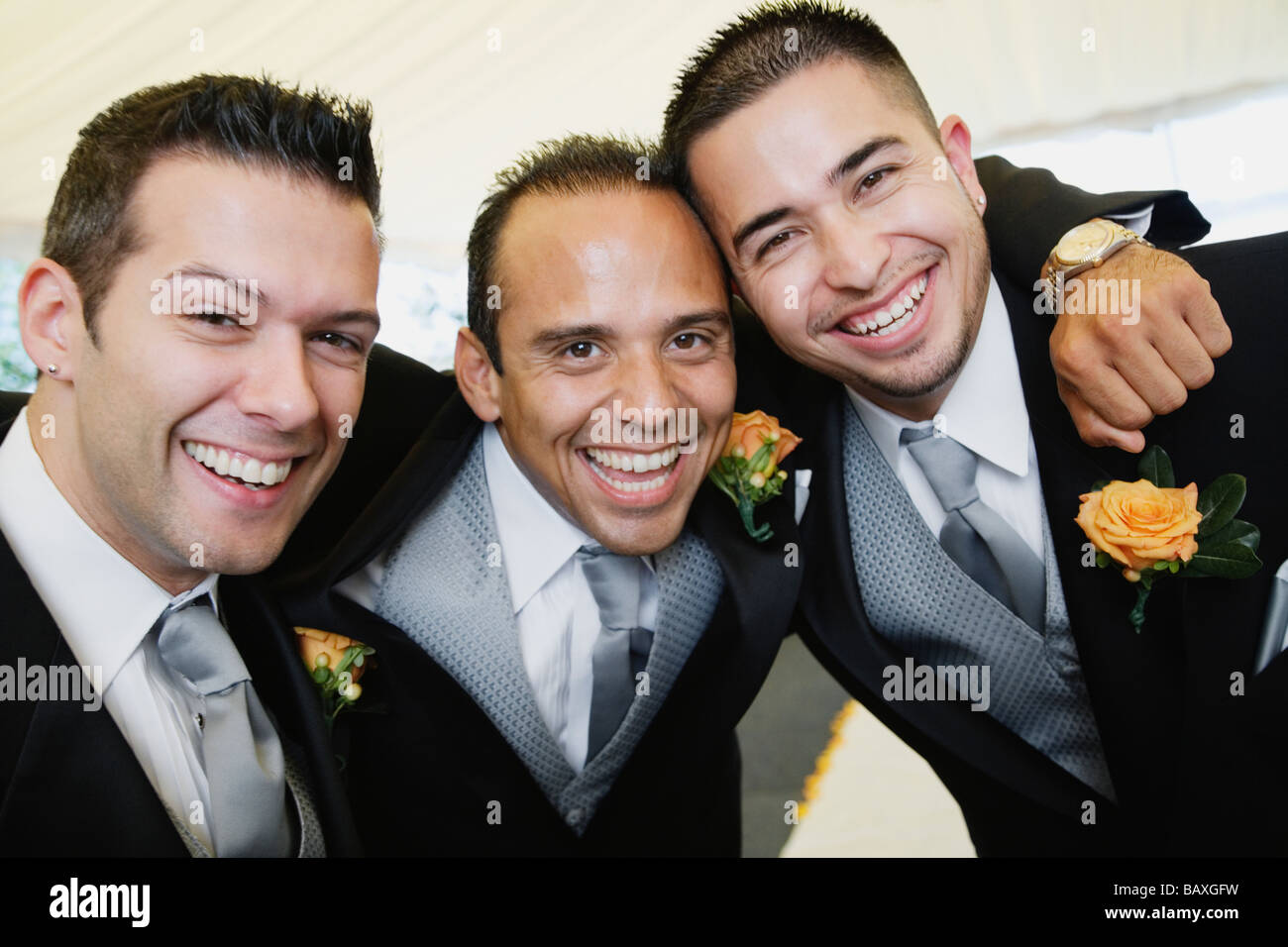 Multi-ethnic men wearing tuxedos Stock Photo