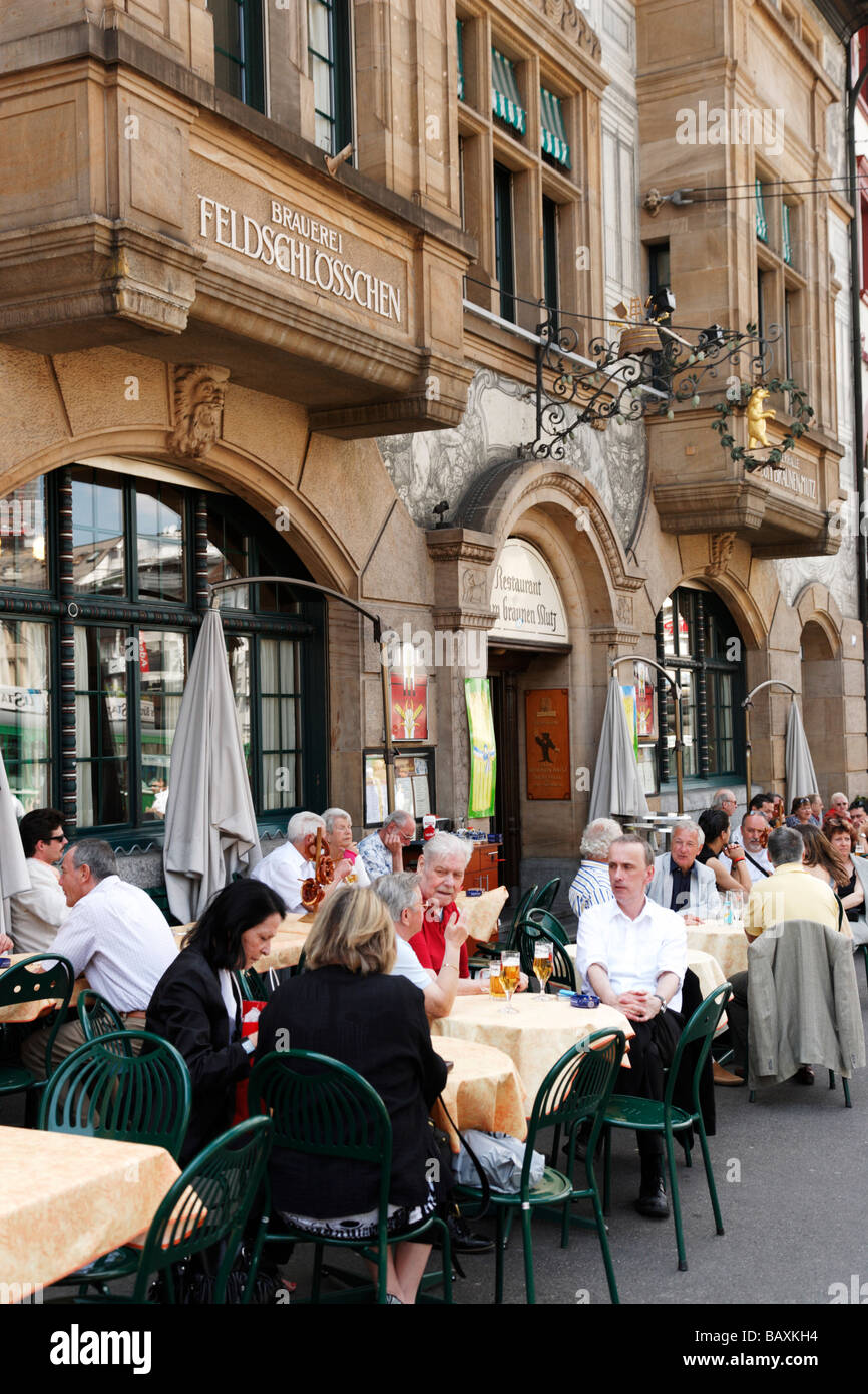 People sitting at tables outside a restaurant, Zum Braunen Mutz, Barfuesserplatz, Basel, Switzerland Stock Photo