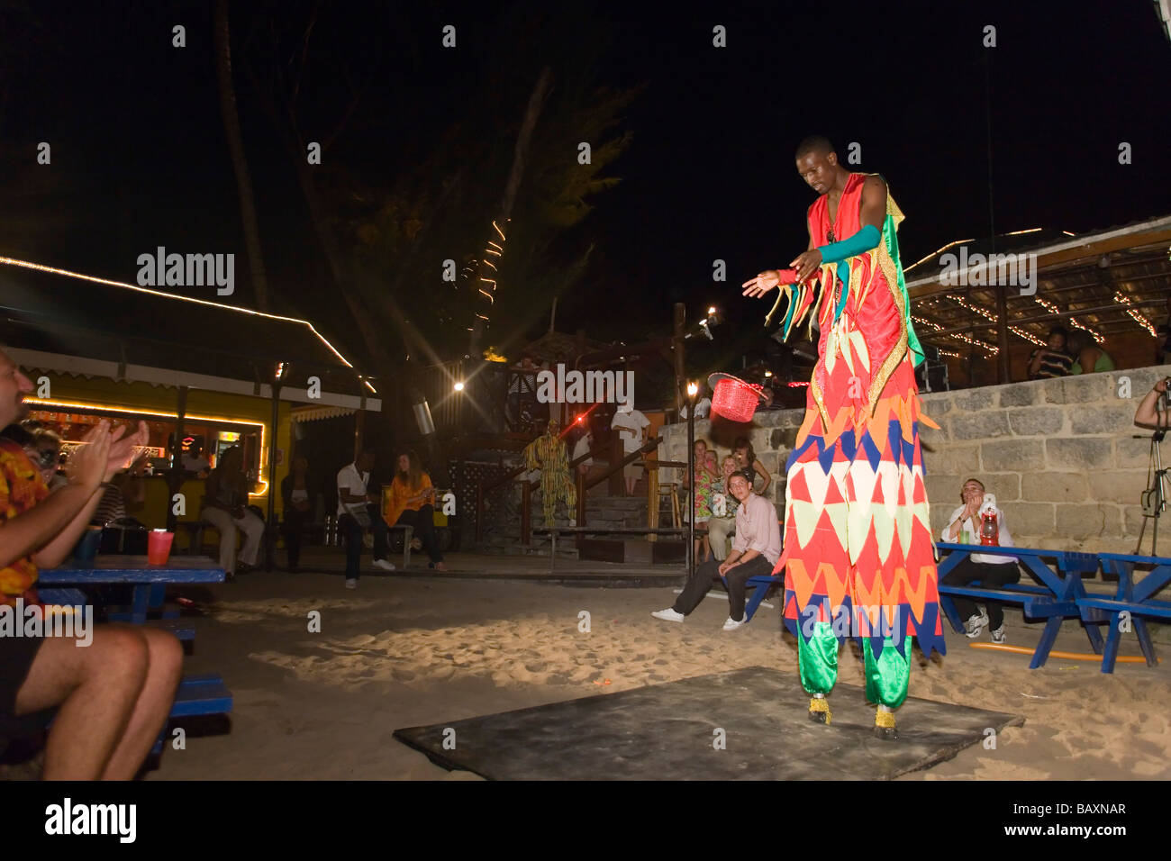 Stiltwalker, Dinner Show in Harbour Lights Club, Bridgetown, Barbados, Caribbean Stock Photo