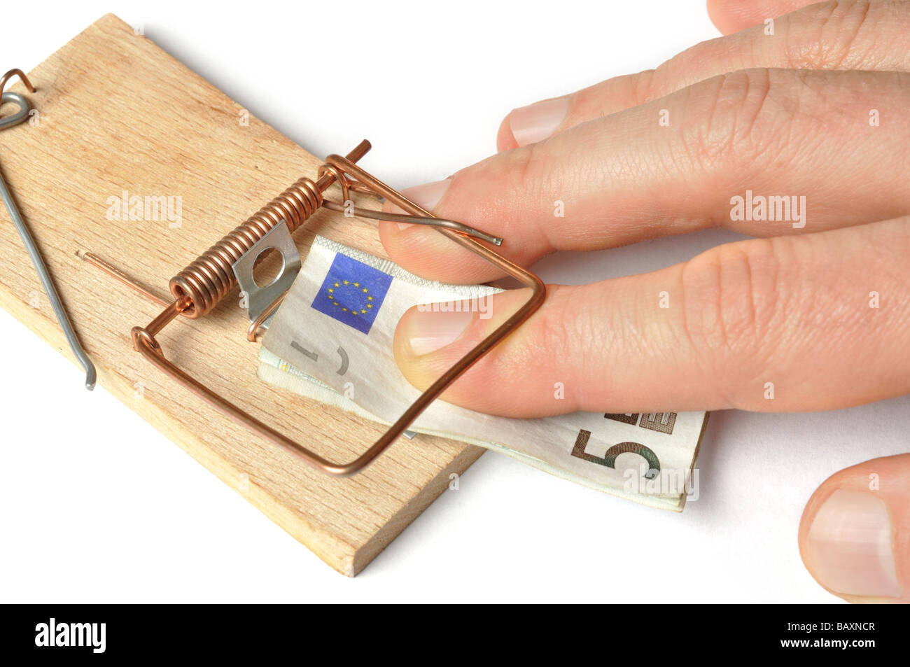 Hand and Mousetrap Stock Photo