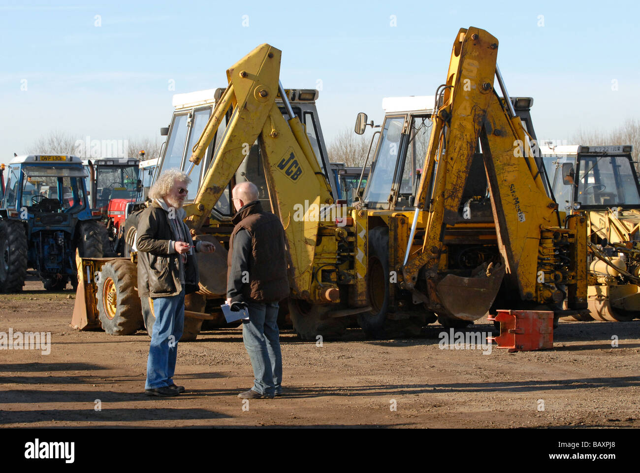 Discussions at a tractor auction UK Stock Photo