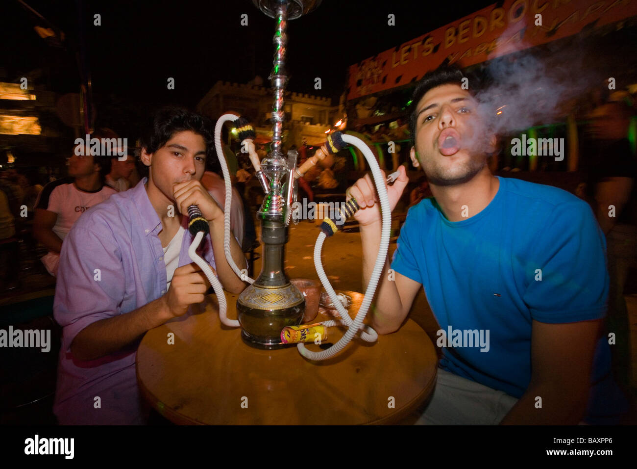 Two young men smoking a water pipe, nightlife, Club, Bar, Agia Napa