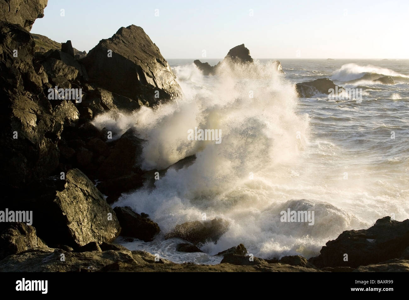 Waves crashing into rocky shoreline - Sue-meg State Park - Trinidad, California USA Stock Photo