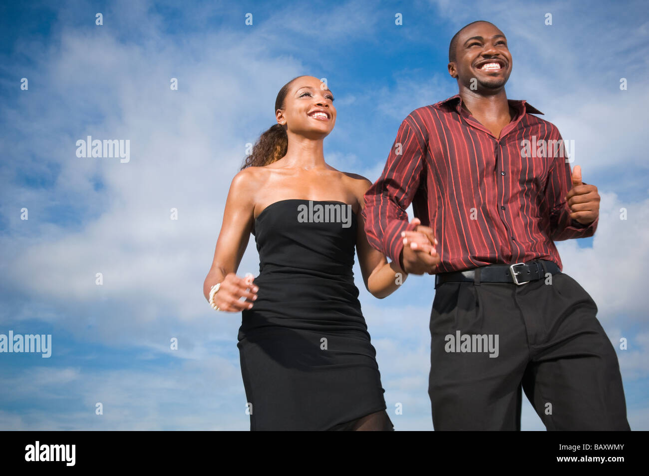 African American couple holding hands Stock Photo - Alamy