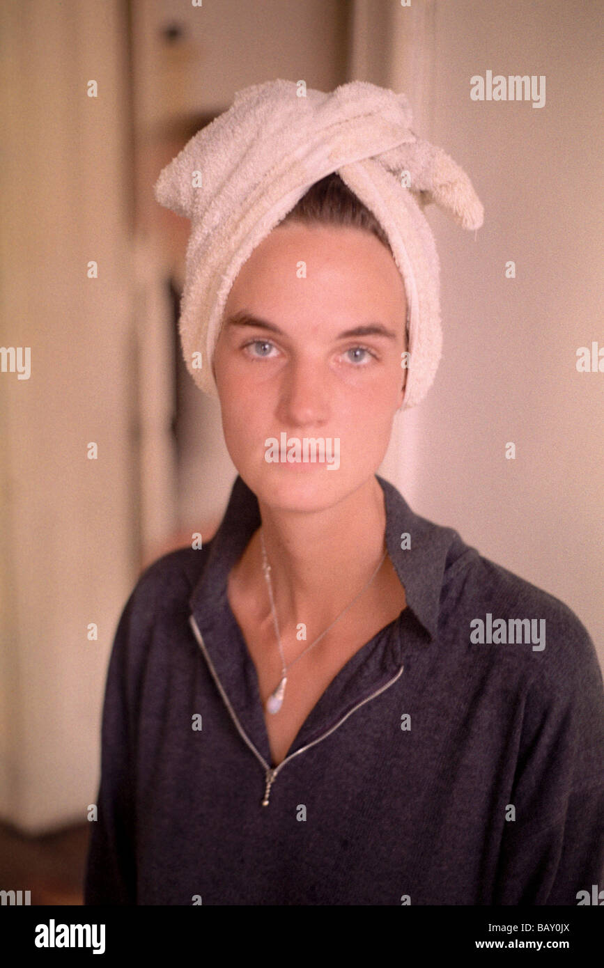 Young woman wearing a towel on her head, Berlin, Germany Stock Photo