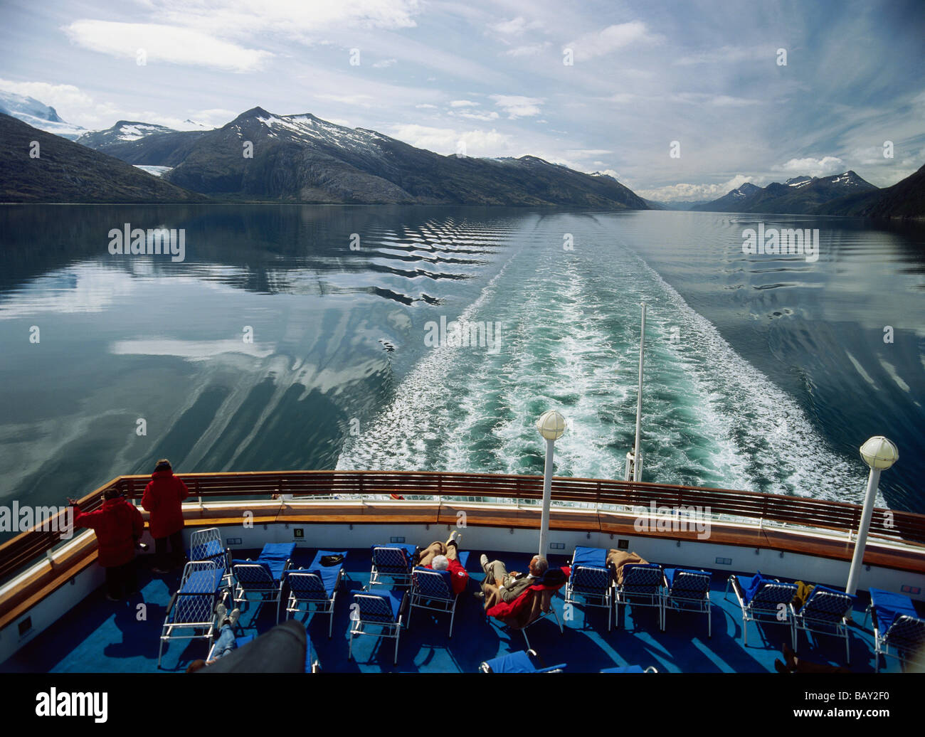 People sunbathing on a stern, Beagle Channel, South Chile, South America Stock Photo