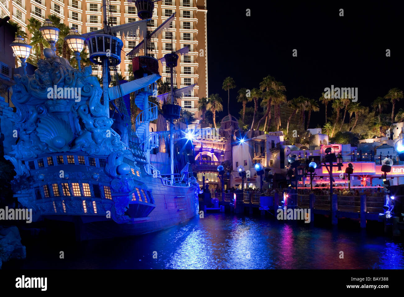A pirate ship illuminated outside the Treasure Island Hotel and Casino in Las Vegas, Nevada, USA Stock Photo