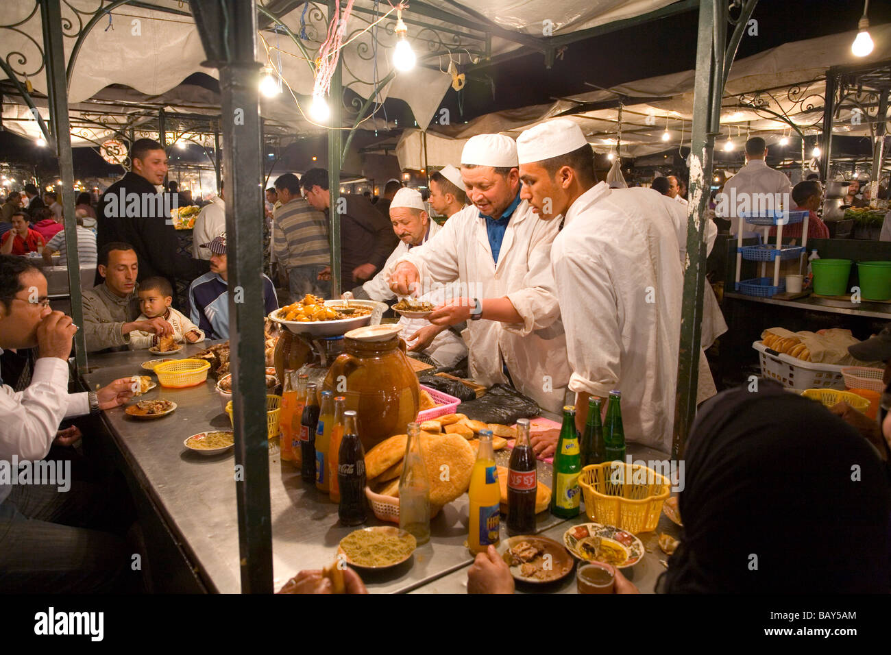 Chefs cooking in Jemaa El Fna Square Marrakech Morocco Stock Photo