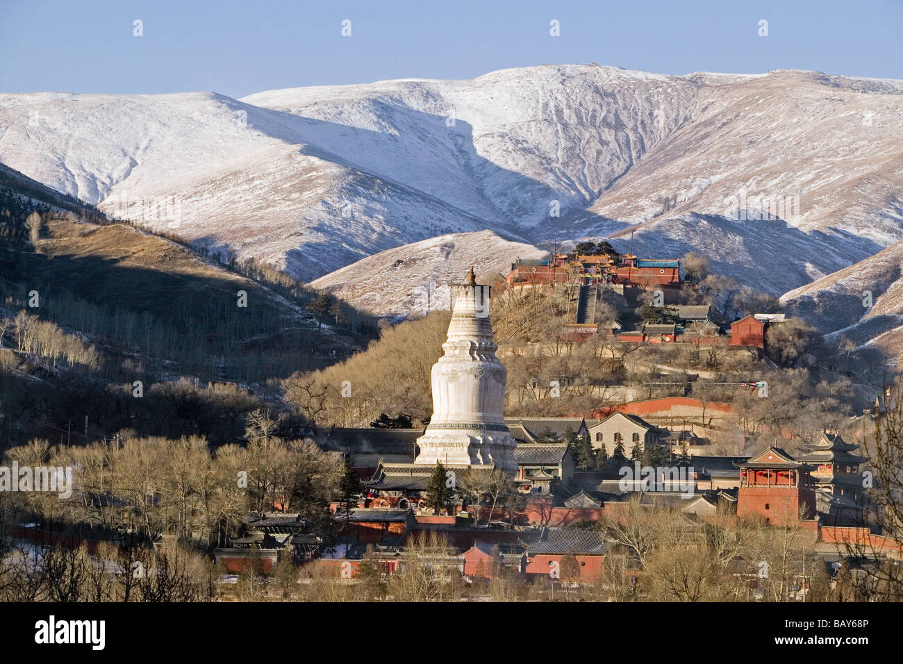 Mountains of Wutai Shan in winter, Five Terrace Mountain, Great White Pagoda, Northern Terrace, Buddhist Centre, town of Taihuai Stock Photo