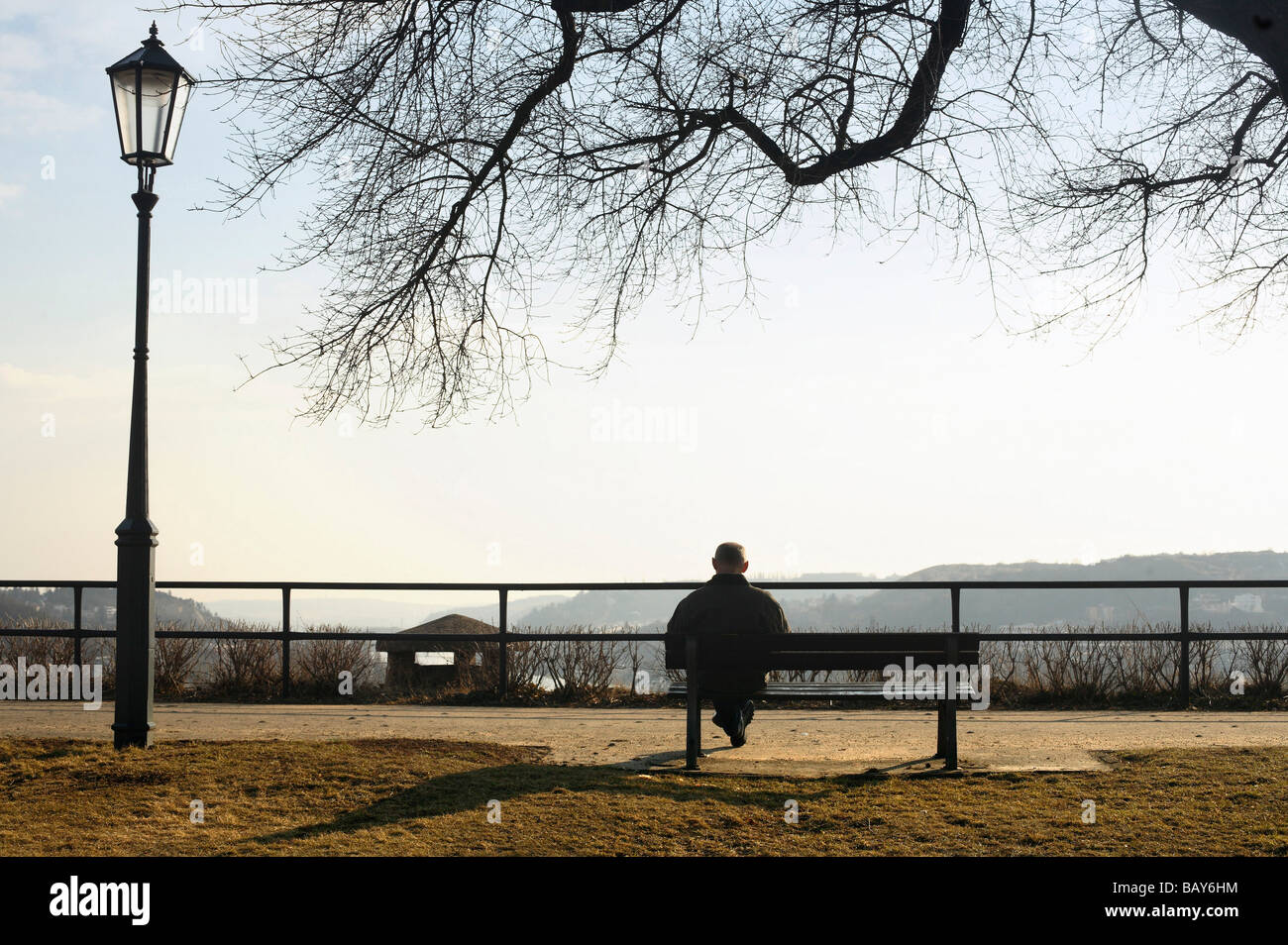 Man bench sitting park hi-res stock photography and images - Alamy