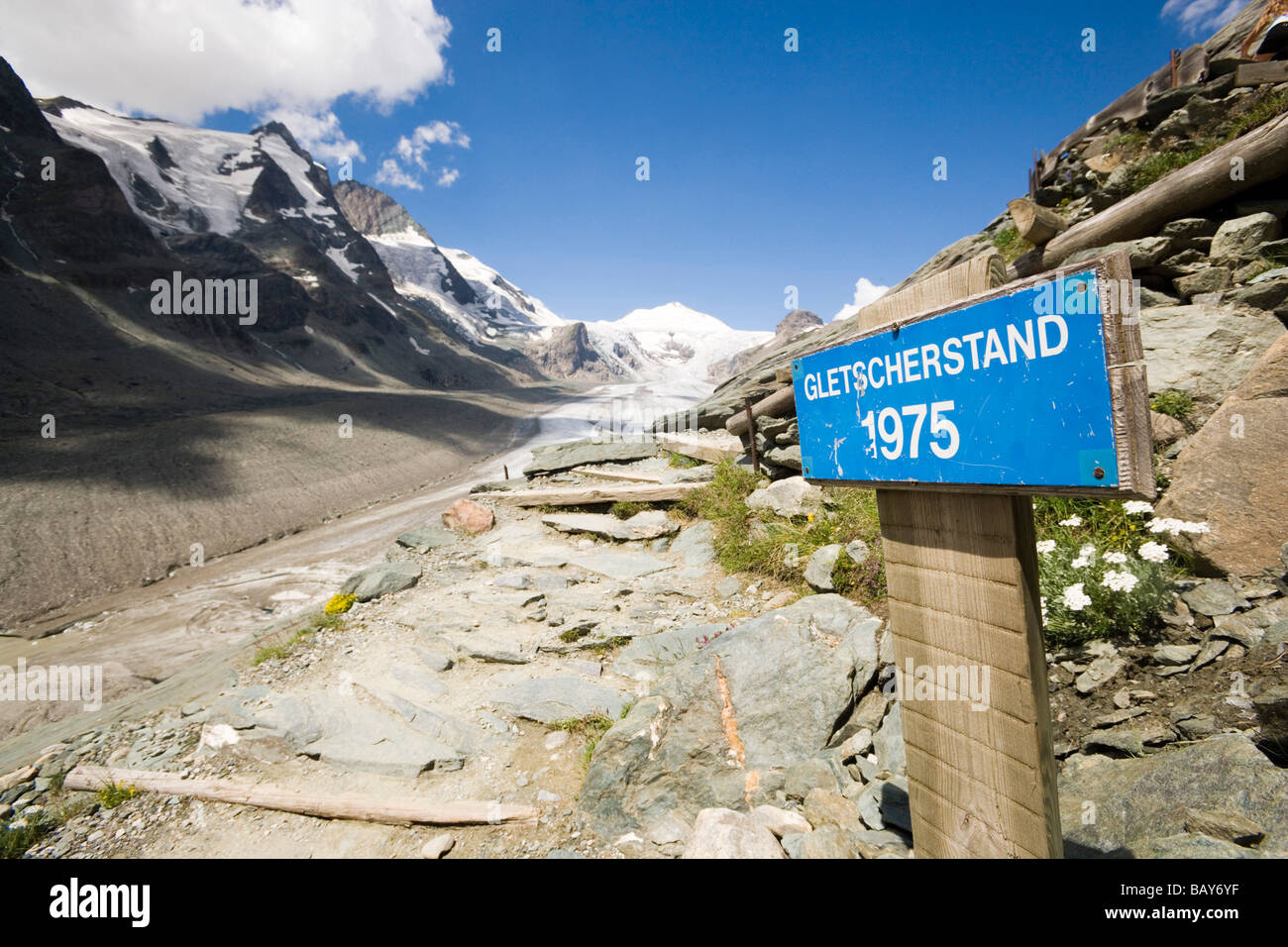 Signpost galcier reduction, Pasterze glacier and Grossglockner, Carinthia, Austria Stock Photo