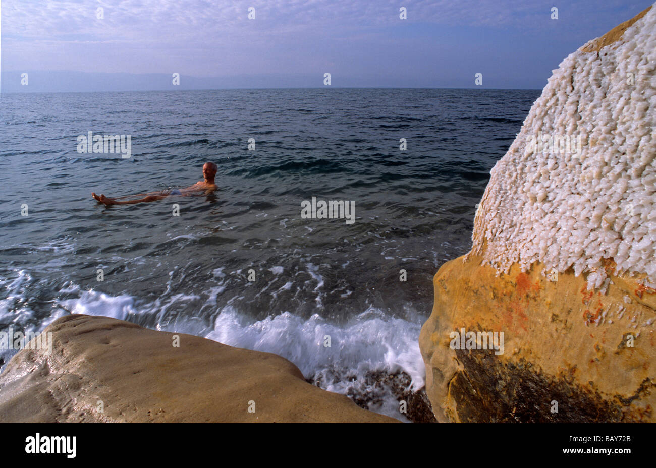 Man bathing in the Dead Sea, Wadi Ibn Hammad, Jordan Stock Photo