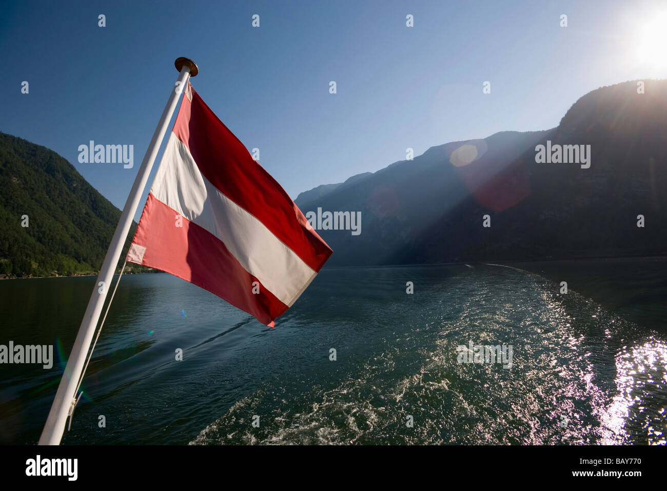 Austrian flag at stern of a ship on Lake Hallstatt, Hallstatt ...