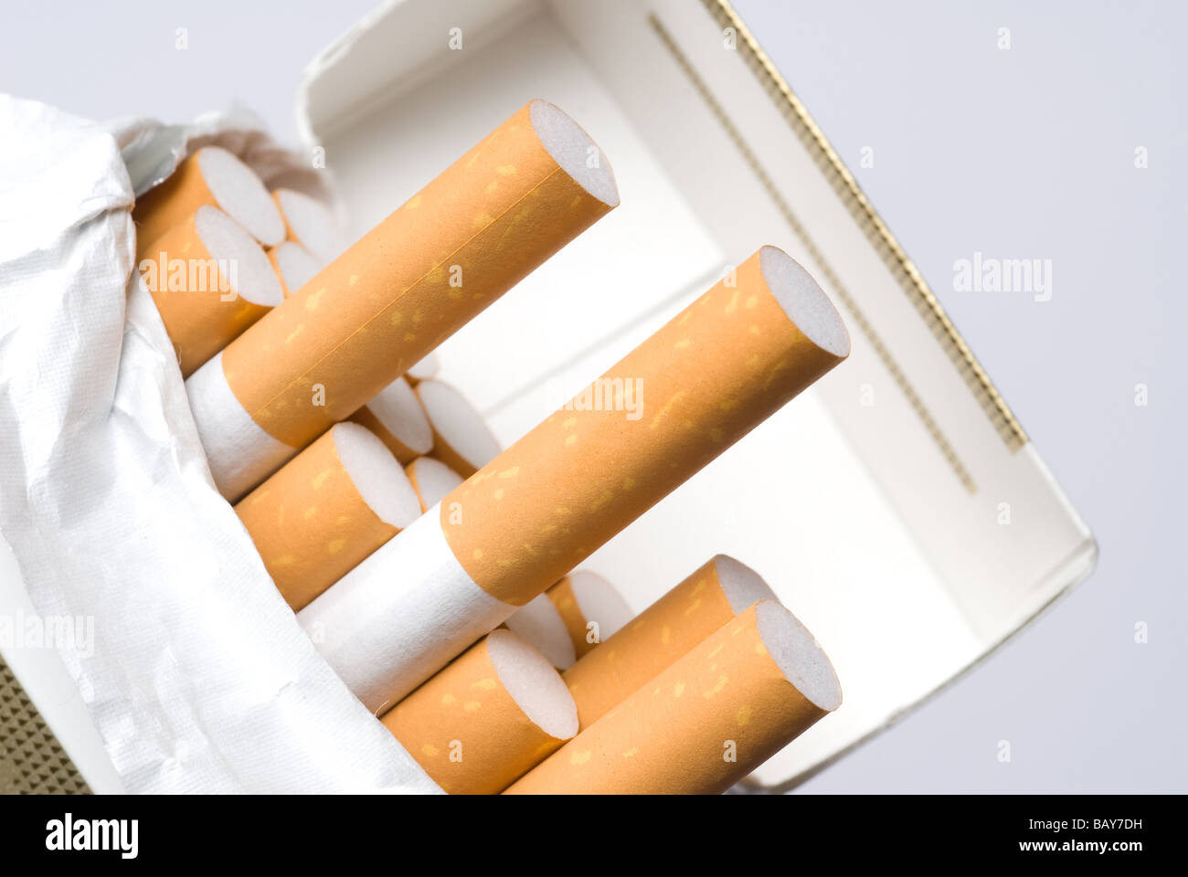 A pack of cigarettes showing the filter end of the smoke Stock Photo