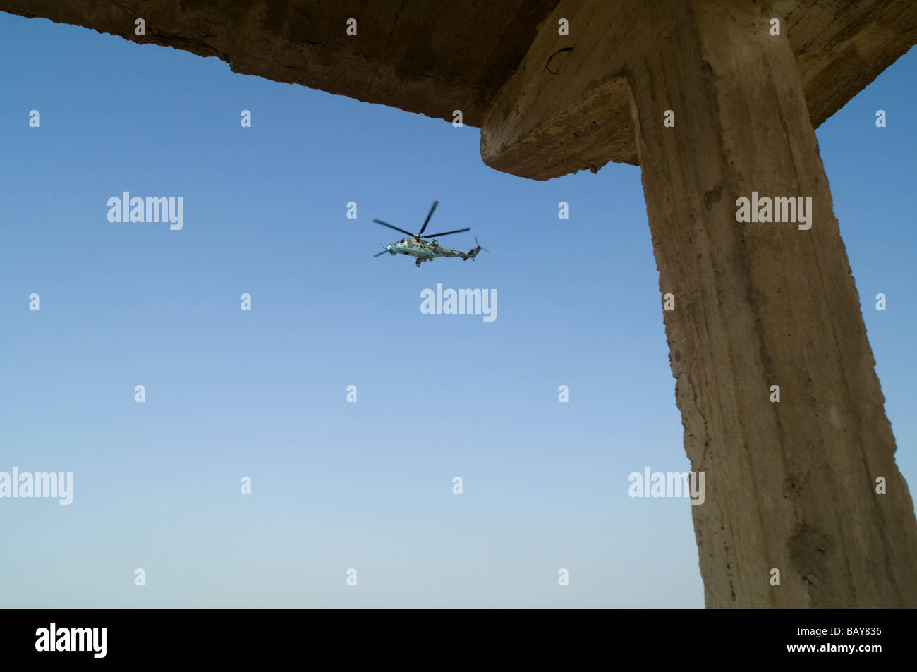Polish military Mi-24 HIND-D helicopter flying in Iraq's Wasit province. Stock Photo