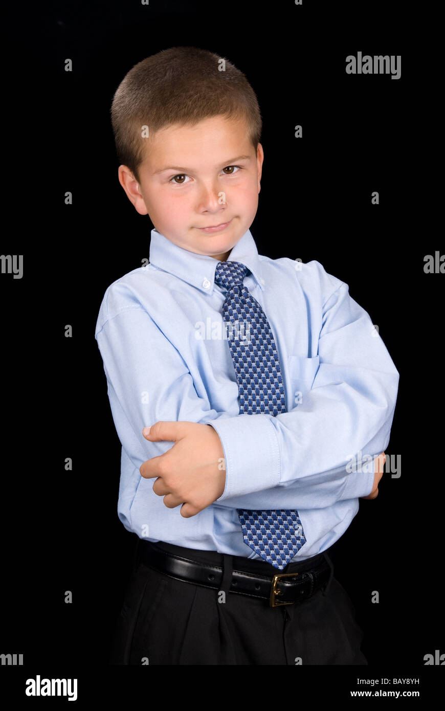 A young business boy in suit and tie giving some attitude Stock Photo