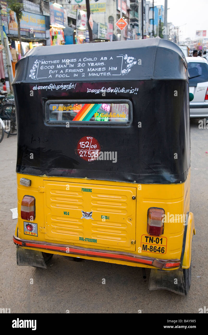 A rickshaw in the city of Kanchipuram India has an unusual sign on its hood. Stock Photo