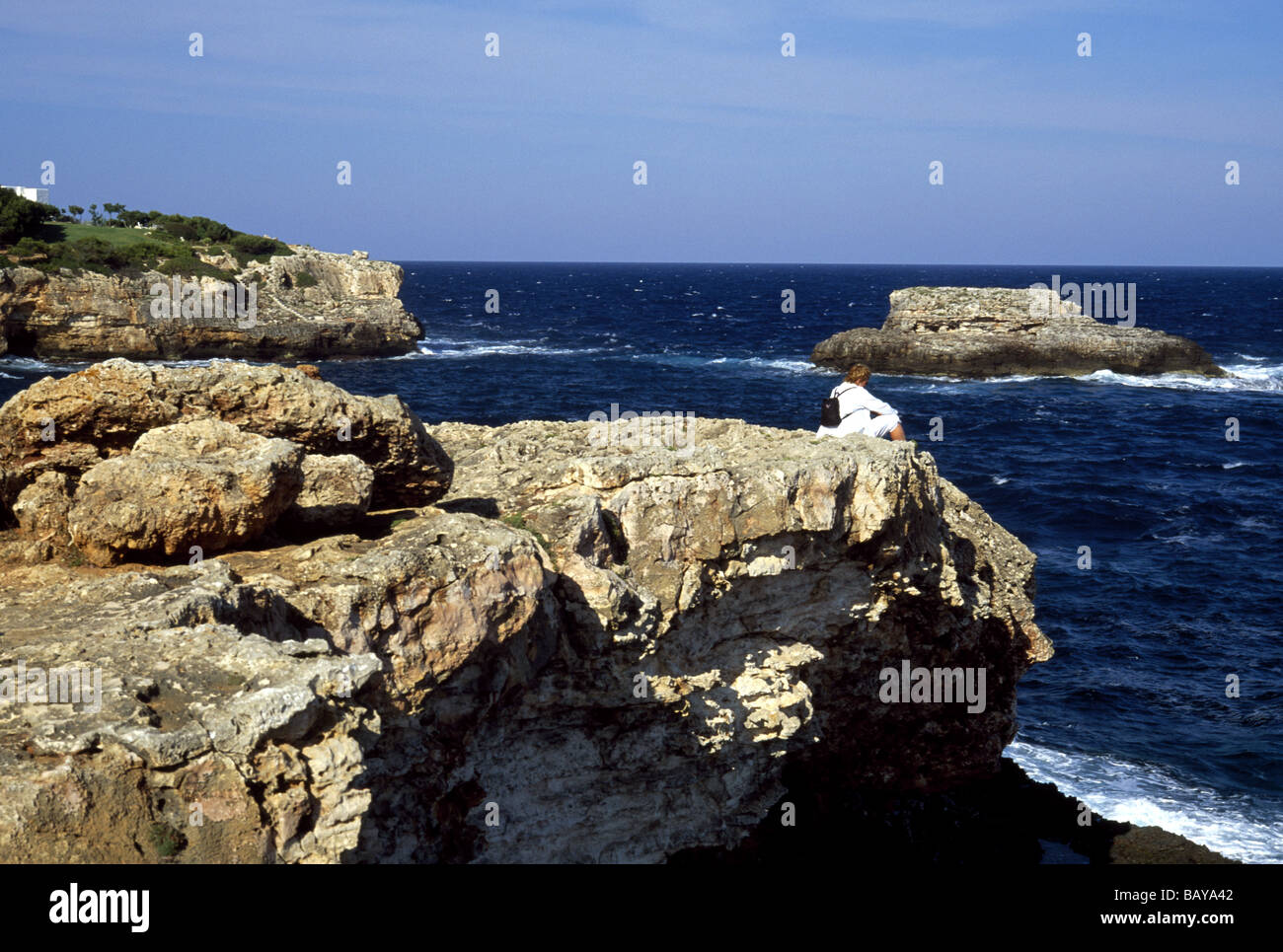 Rocky coast at Cala Esmeralda, Cala d'Or, Majorca, Spain Stock Photo ...