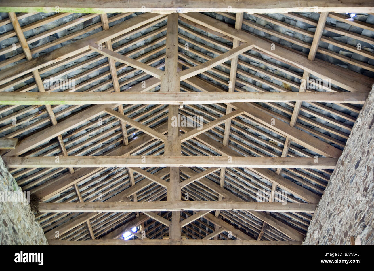 traditional hand made timber roof trusses with mortice and tenon joints Stock Photo