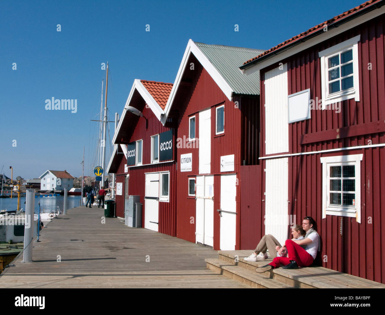 Traditional red wooden buildings in village of Smogen on Swedens Bohuslan coast Stock Photo