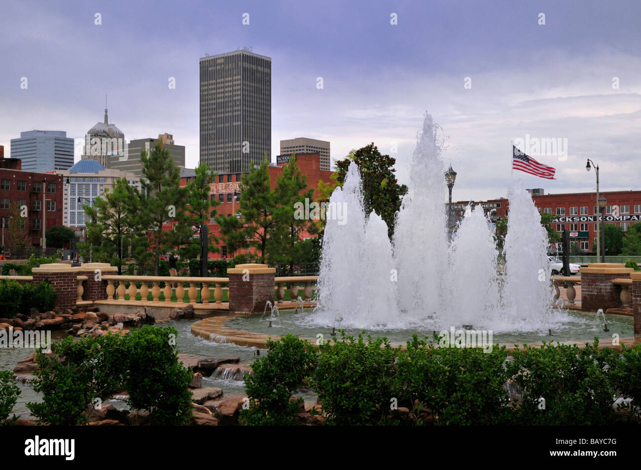 Sparkling fountains highlight the view of downtown Oklahoma City from Bricktown Stock Photo