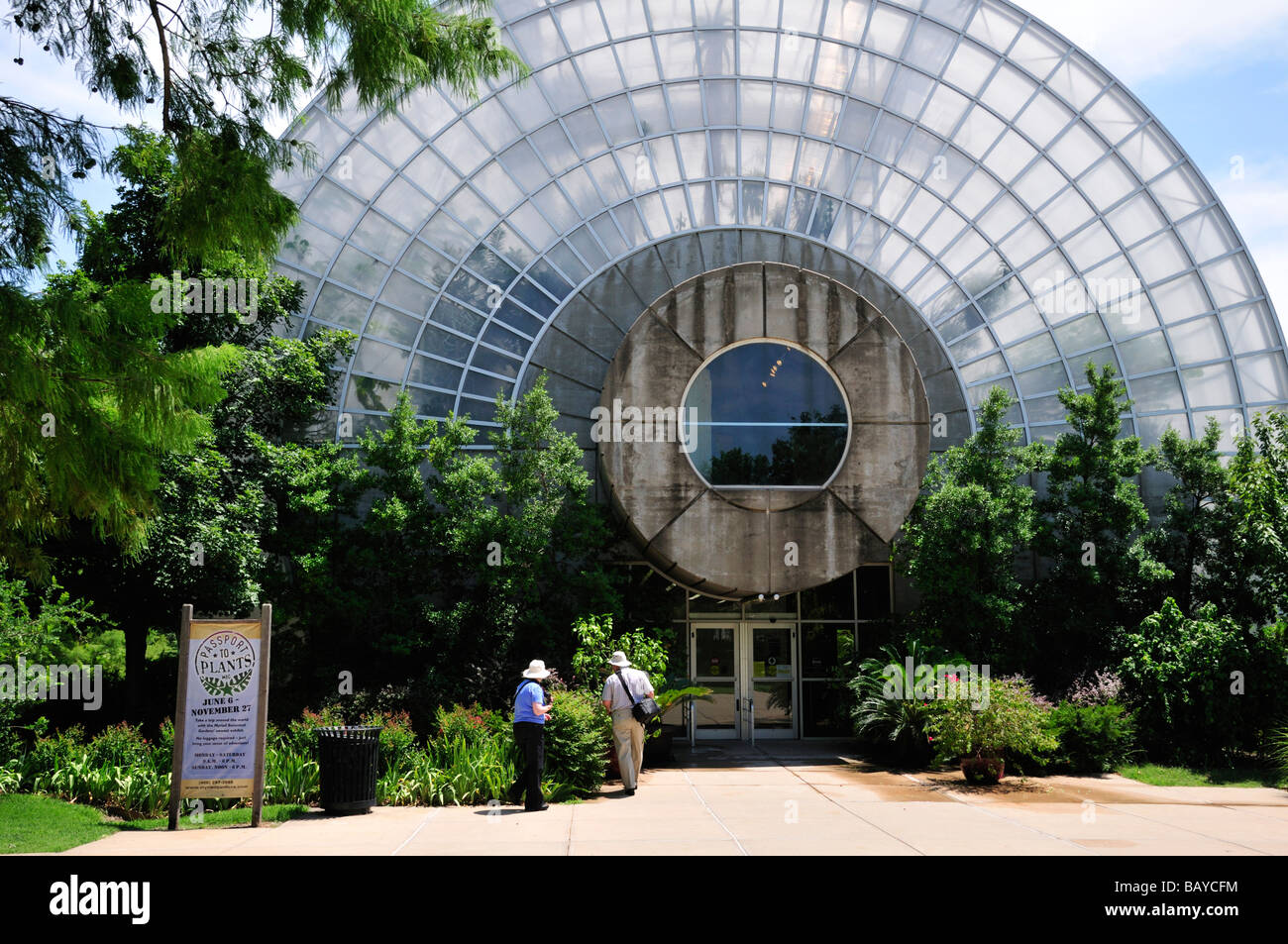 Couple at rear entrance to Myriad Botanical Garden conservatory, Oklahoma City Stock Photo