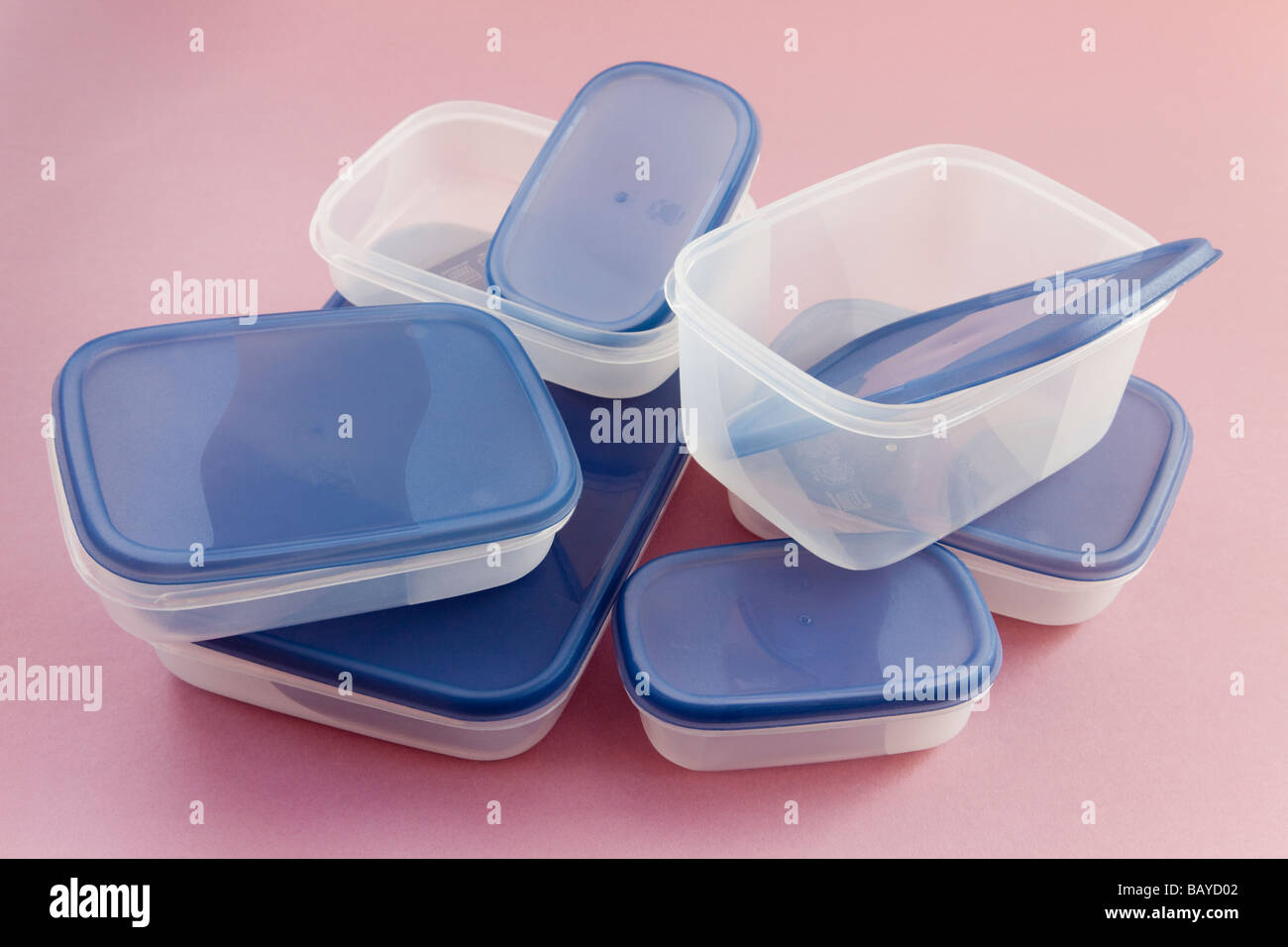 Plastic food containers with lids in various sizes and shapes Stock Photo