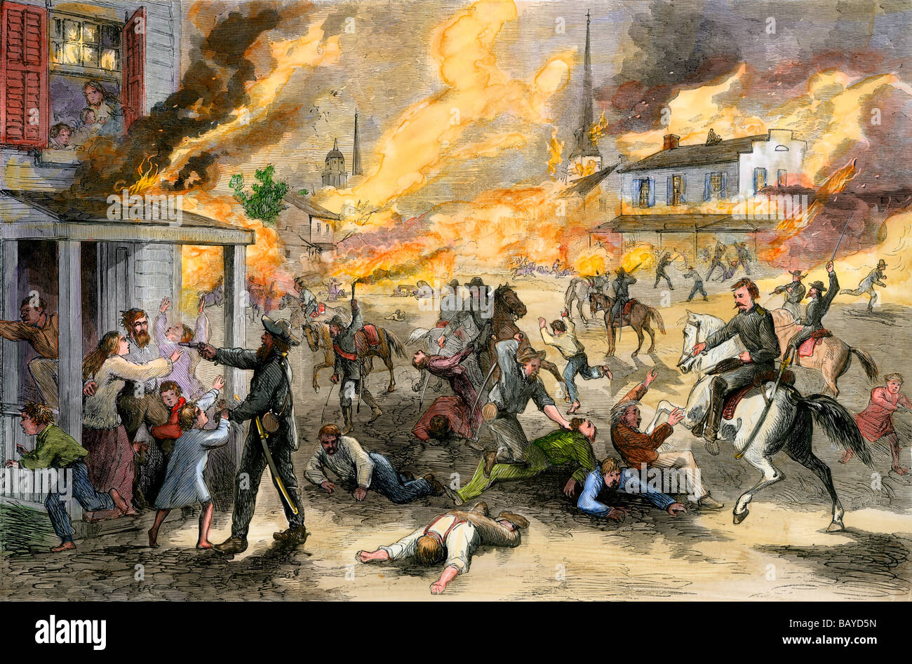 Confederate raiders under William Quantrill destroying Lawrence Kansas 1863. Hand-colored woodcut Stock Photo